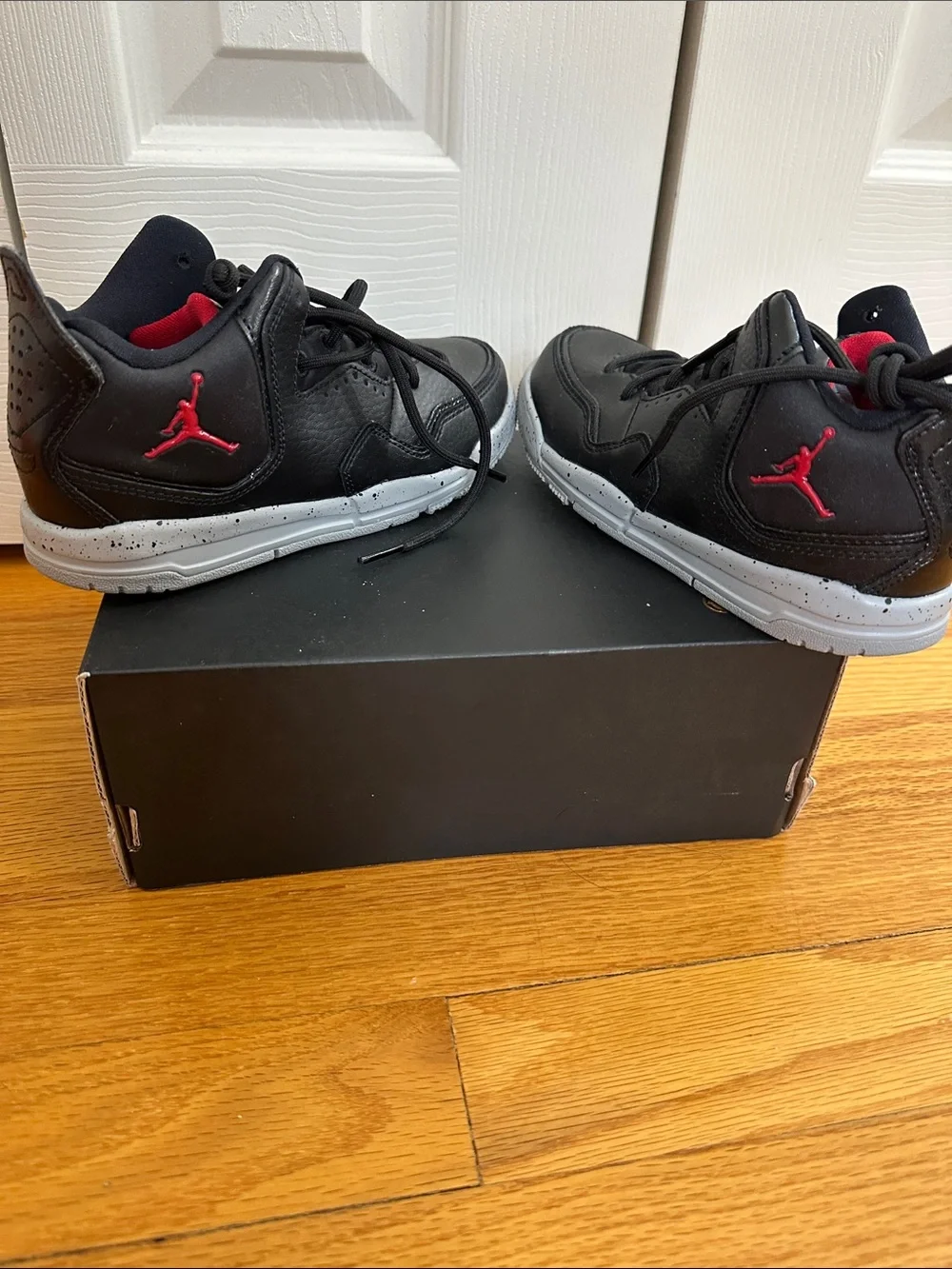 Jordan Kids Black Sneakers with Red Jumpman and Gray Sole
